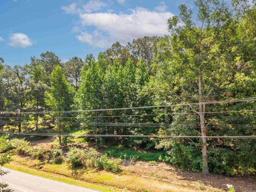 Beautiful 6 Acres to build your forever home or a buyer can have the property rezoned to accommodate multiple homes. To own 6 acres close to town is few and far between!! This is it. Dont let this pass you by.