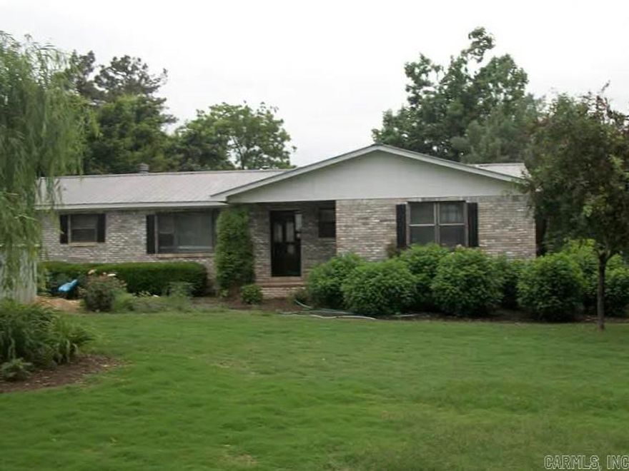 Charming Ridge-Top Home Near the State Park! Welcome home to this beautifully maintained ridge-top property, located just beyond the state park entrance. This move-in ready home features 3 bedrooms, 1 full bath, and 2 half baths, offering space and comfort for any lifestyle.  The primary bedroom includes a cozy gas-log fireplace, while the all-electric design and metal roof ensure low maintenance and efficiency. The kitchen shines with solid surface countertops, tile flooring, double wall oven, smooth-top cooktop, and breakfast bar—perfect for everyday living or entertaining.  Outside, enjoy a fenced, flower-filled yard, two covered parking areas, and a storage building with nearby storm shelter for added peace of mind.  Just minutes from the state park, this home combines charm, quality, and a great location.  ?? Don’t miss this rare find—schedule your showing today!