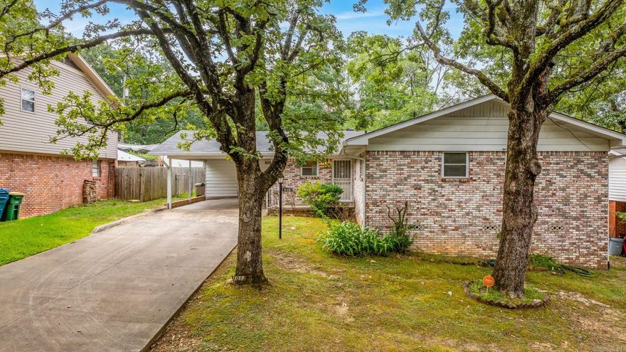 Perfectly modern in Mid-Town! This ideal location will leave you close to all Little Rock has to offer. The upgrades here are too numerous to list but include paint, flooring, and a brand new primary bathroom! The two living spaces make this ideal for work from home families, or roommate situations. The lovely lawn and fully fenced backyard are serene places of retreat from a long day. The newer appliances in the kitchen and indoor laundry allow for the ease of cooking and cleaning. This home includes washer, dryer, and refrigerator all you need to do is move in and make 1013 N Coolidge your new address!