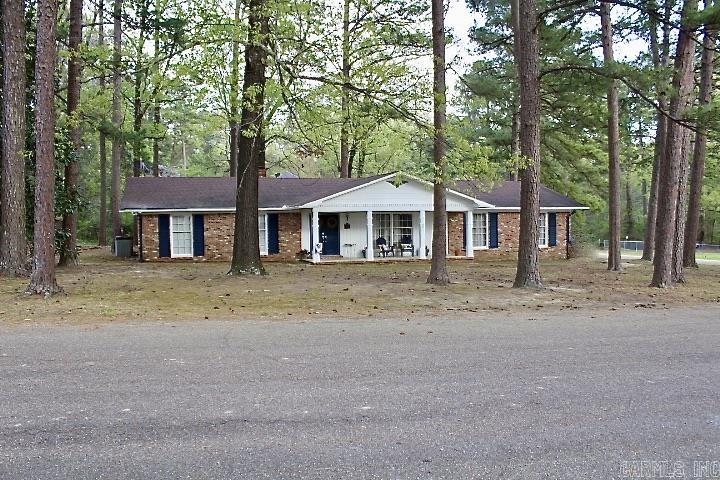 Come see this updated home on a corner lot in one of Fordyce's most desired neighborhoods. This 3 bedroom, 2 bath home offers an open kitchen with granite countertops, stainless steel appliances and an island perfect for eating, prepping your next meal or just a nice place to hang out. This open concept kitchen lets you decide whether you want to use the adjoining space with a fireplace as a dining area or a family room. French doors lead into another flexible living space suitable for dining/family room, game room, music room or whatever you'd like it to be. This beautiful home sits amongst tall pine trees with a screened-in-porch where you can relax and enjoy the peaceful outdoors. These flexible spaces offer options for you to create your own personal oasis and is waiting for you to Call it HOME!