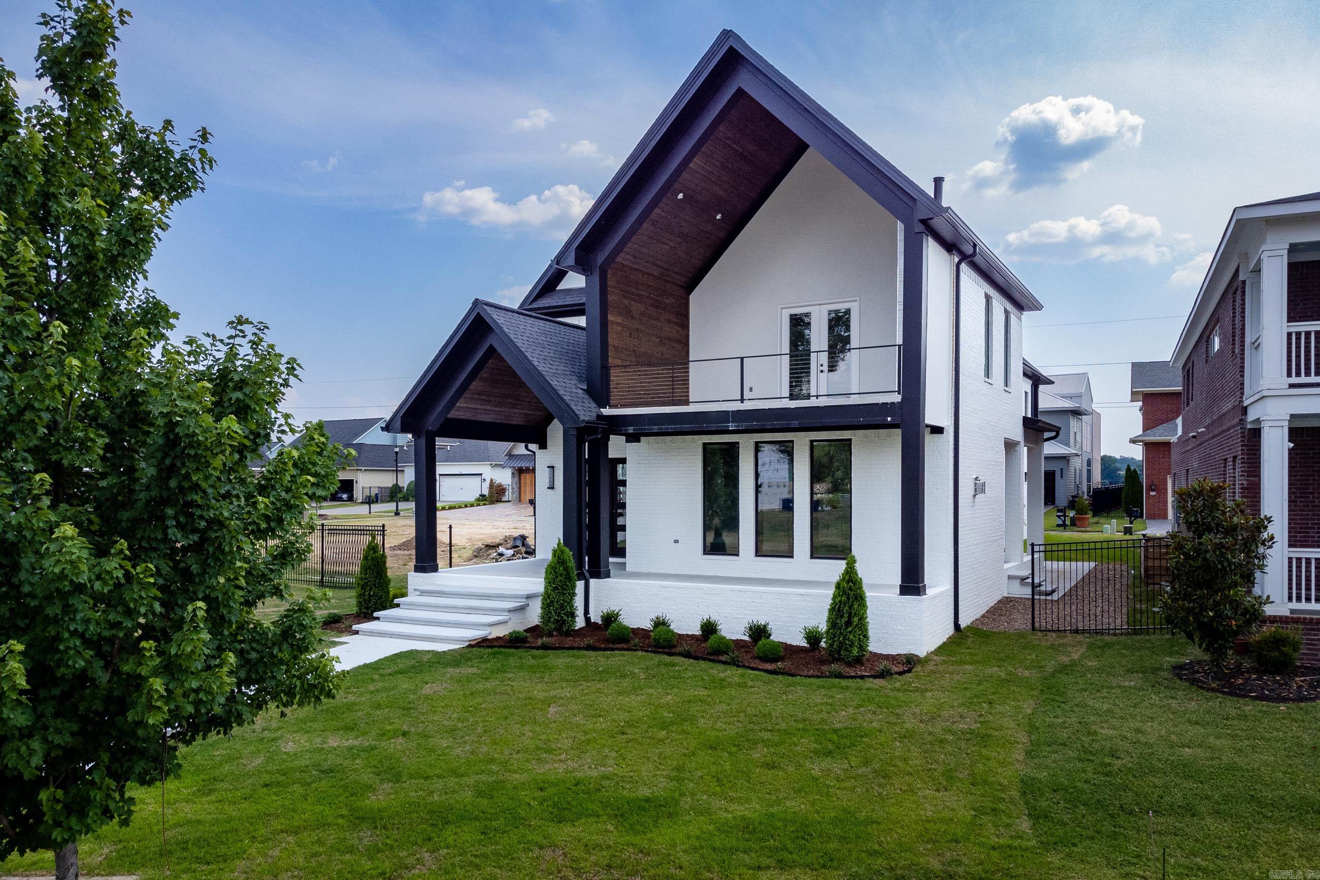 This gorgeous custom house nestled on the banks of the Arkansas River is almost ready to welcome you home! Amazing two story home under construction is located in unique Rockwater Village, a traditional neighborhood blending community, family & luxury living. Adjoining the Arkansas River Trail and minutes from art, entertainment, restaurants, shopping & sports, there's always something to do! Tall ceilings, décor paint, natural light, hardwood floors and elegant fixtures are just some of the impressive features you'll love. Stunning floating iron staircase takes you upstairs where you'll find the most luxurious Primary suite with gas fireplace, built-ins, vaulted outdoor balcony with wood burning fireplace, spa bath and huge closet. Also there are 2 guest bedrooms with shared bath and bonus/media room with balcony views of the river. Main level has bedroom and guest bath. Two car garage, one side is extra deep. Come See!
