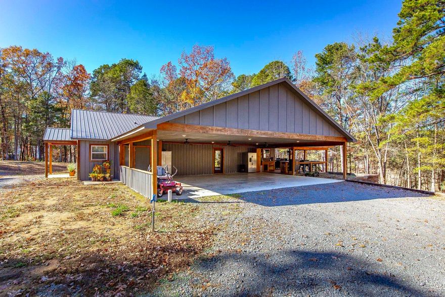 LAKEFRONT dream home!!! It has a private boat dock with two slips! Escape to your own very private paradise on 2.12 acres. Very unique home.  Open floor plan. 3 bedrooms and 2 baths.  Comfortable deck over looking the lake. Nice outdoor cooking area.  Plenty of room for all your guest!  Mostly Furnished Lakehouse. Low maintenance. Just bring your clothes and enjoy life!!!!!!