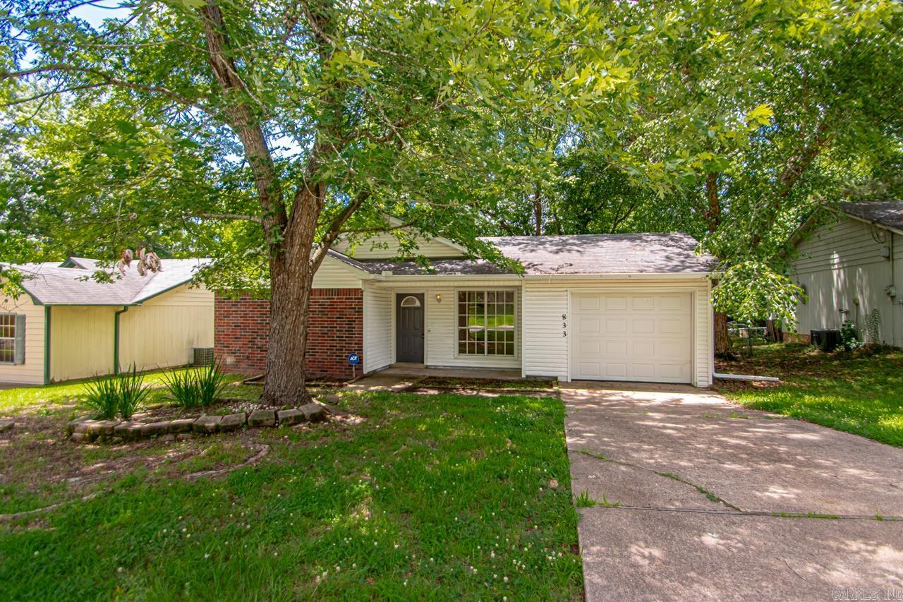 Welcome to 833 Cole Drive—a well-maintained home offering over 1,000 square feet of comfortable living space. This 3-bedroom, 2-bathroom property features a spacious living room with vaulted ceilings, a functional galley-style kitchen, and direct access to a serene backyard retreat. Enjoy the convenience of all hard surface flooring—no carpet throughout. Additional highlights include new gutters and a small storage shop in the backyard ** Agents schedule showings on broker bay**