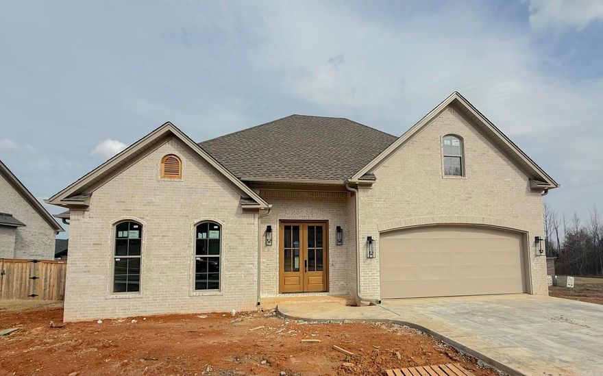 Gorgeous new construction home in Southwest Conway! Stunning tile showers, LVP and tile flooring, elegant gold finishes, and arches throughout. 3 true bedrooms with a smaller office right off of the kitchen. A designated walk in pantry with custom shelving and custom cabinetry throughout the home! Don't miss this opportunity!