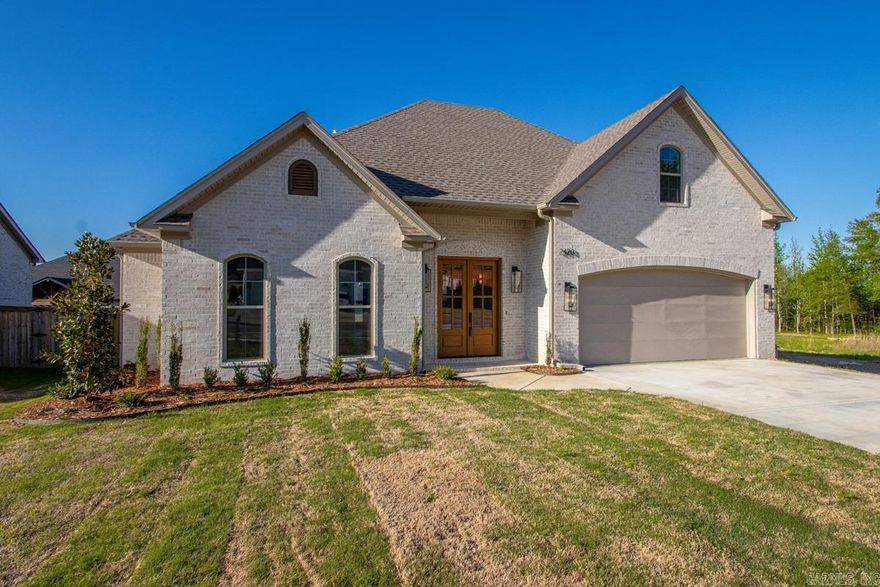 Gorgeous new construction home in Southwest Conway! Stunning tile showers, LVP and tile flooring, elegant gold finishes, and arches throughout. 3 true bedrooms with a smaller office right off of the kitchen. A designated walk in pantry with custom shelving and custom cabinetry throughout the home! Don't miss this opportunity!