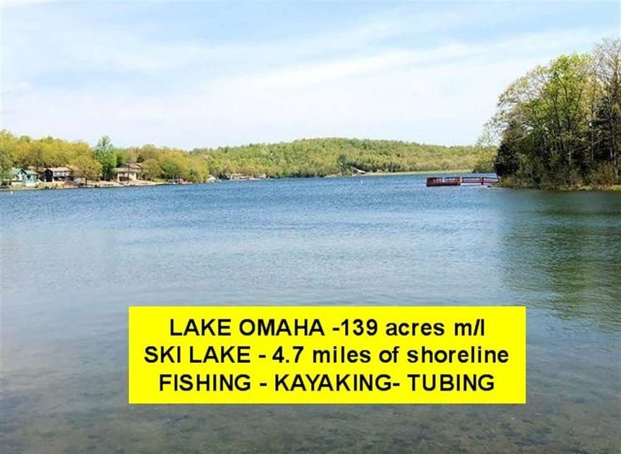 LAKE OMAHA!  Your opportunity to purchase TWO wooded LAKE LOTS at a fantastic price -  JUST $19,500 for both - consisting of approx. 1.16 acres in total- Omaha Lake in Cherokee Village, AR is a hidden gem off the main path-perfect for those seeking peace and quiet, yet just minutes from 18-hole golf course and 6 other lakes!  Close to fitness center & pickle ball court.  Omaha lake is 139 acre ski lake with 4.7 miles of shoreline.  Excellent fishing, kayaking, tubing.  Newer survey.  Listing #2410 Measurements per arcodata