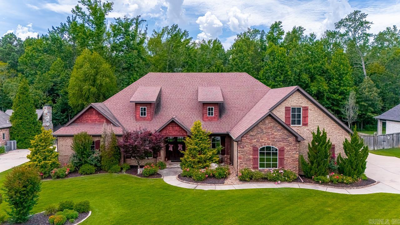 Stunning, luxury home with pool & outdoor living in gated area of Hurricane Lake! Designed for comfort, elegance, & entertaining, this 4BR,4.5BA home truly has it all. Featuring spacious bedrooms, a dedicated office or dining room, expansive bonus/media room with projector, screen & a built in full size murphy bed, a safe room, oversized 3 car garage, & a whole house Generac generator. Outdoors you have gorgeous landscaping with a full sprinkler system, fully fenced private backyard oasis backing up to green space, a back wrought iron fence for unobstructed view of wildlife, an outdoor pool house with bathroom for convenience, covered living area with woodburning fireplace, & a cozy fire pit for relaxing evenings. This home is thoughtfully designed for both everyday living, hosting, & entertaining. With functional spaces and resort style amenities, it truly is a rare find. Minutes from shopping, dining, and to the interstate, donāt miss this opportunity to make this dream home yours!