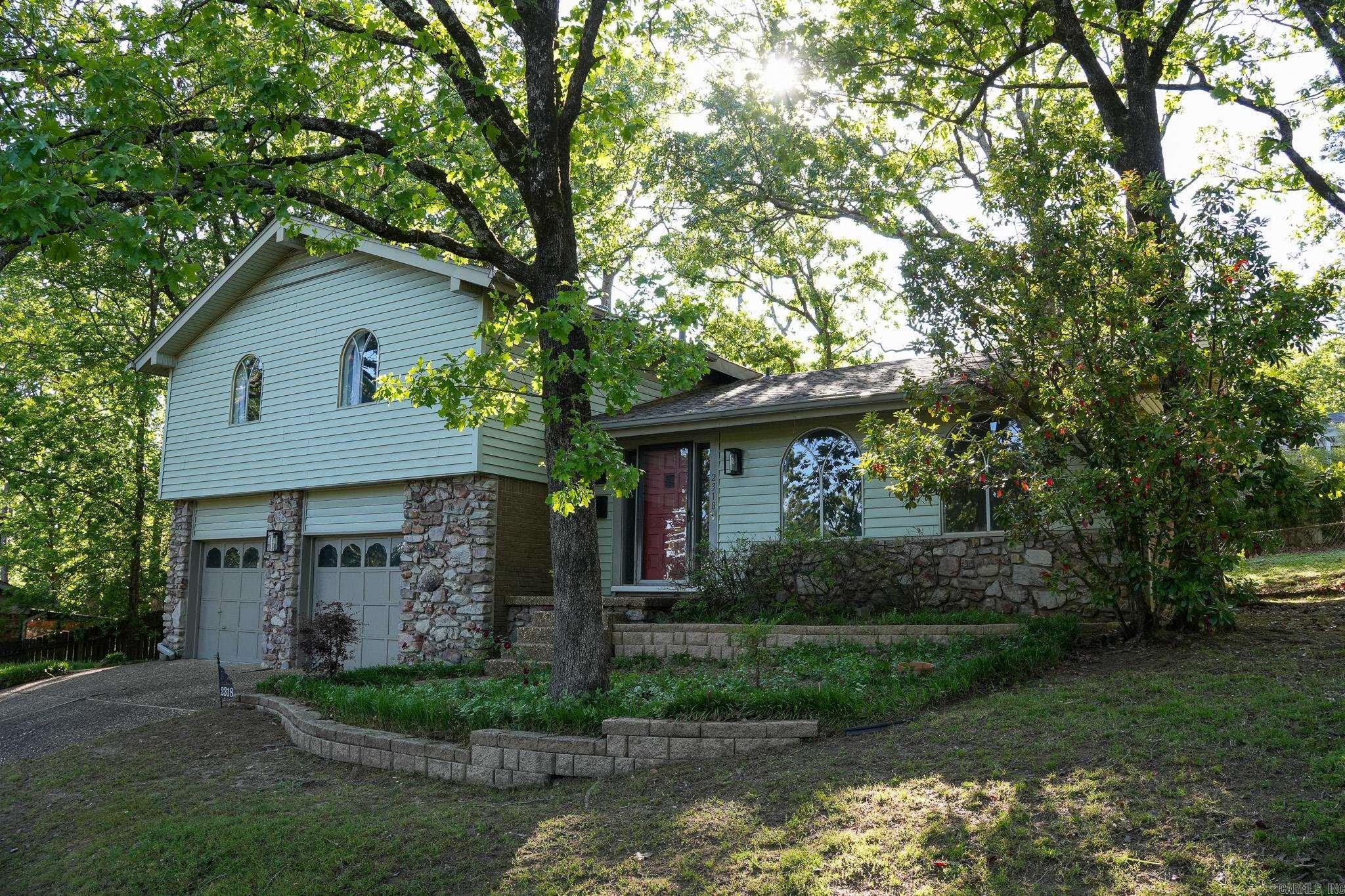Welcome to 2318 Breckenridge Dr, a beautiful home in the heart of Little Rock! This property boasts numerous upgrades, including a brand-new roof installed at the end of 2024, fresh insulation throughout the attic and garage walls, and newly installed sheetrock in the garage. The trim and doors have been freshly painted, giving the home a crisp and modern look. Enjoy the convenience of smart thermostats for energy efficiency and comfort year-round. Located just minutes from shopping, dining, and top-rated schools, this home offers easy access to I-430 and I-630, making your commute a breeze. Parks, trails, and recreational areas are nearby, adding to the charm of this ideal location. Don't miss out on this move-in-ready gemāschedule your showing today!