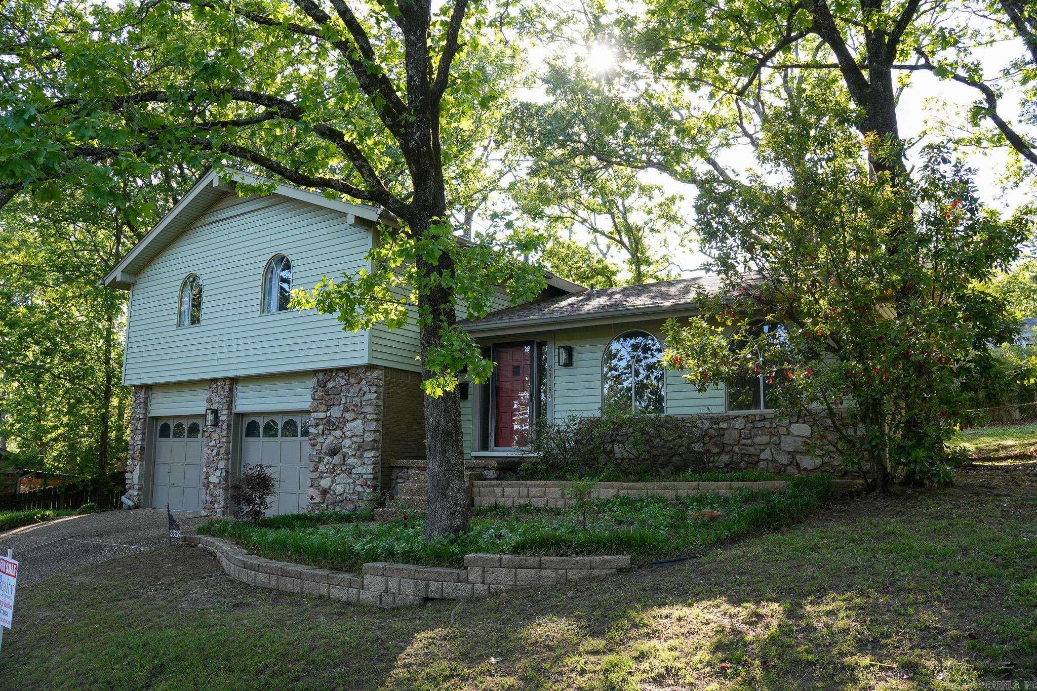 Welcome to 2318 Breckenridge Dr, a beautiful home in the heart of Little Rock! This property boasts numerous upgrades, including a brand-new roof installed at the end of 2024, fresh insulation throughout the attic and garage walls, and newly installed sheetrock in the garage. The trim and doors have been freshly painted, giving the home a crisp and modern look. Enjoy the convenience of smart thermostats for energy efficiency and comfort year-round. Located just minutes from shopping, dining, and top-rated schools, this home offers easy access to I-430 and I-630, making your commute a breeze. Parks, trails, and recreational areas are nearby, adding to the charm of this ideal location. Don't miss out on this move-in-ready gem—schedule your showing today!