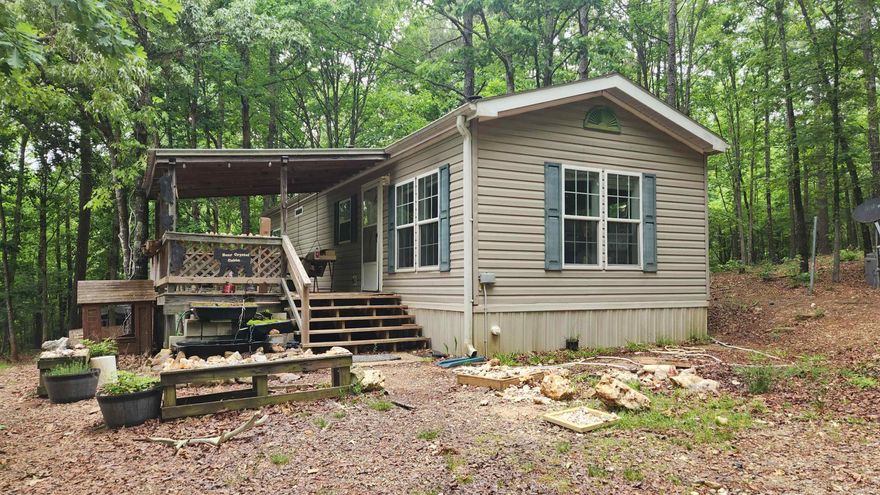 Discover a rare opportunity to own a private quartz mine on 39.10 scenic acres in Pine Ridge AR, bordering the Ouachita National Forest on two sides. This unique property features three active mining sites, including one currently producing sought-after Smokey Quartz and two additional sites known for clear quartz specimens and tabbies. The property includes a 1991 excavator, pumps, gift shop, 1 bed / 1 bath mobile home, three storage buildings, and a livestock/chicken pen with shed. Natural features include a spring-fed creek, three natural springs, fenced garden area, two food plots, and a hot tub — offering a blend of income potential, recreation, and off-grid living appeal. A truly one-of-a-kind investment, homestead, or retreat property with direct access to nature and established mining history. Includes hunting opportunities.