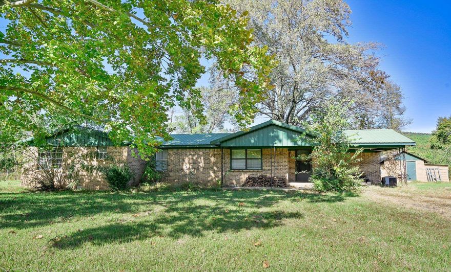 Discover country living at 4844 Highway 270! This cute one-level brick home with a durable metal roof sits on approximately 1 acre surrounded by nature. Perfect for a small homestead or simply relaxing after a long day’s work. The interior is clean, comfortable, and ready for your personal touch. Enjoy the quiet pace of rural life while still being conveniently located just 28 minutes from Mena and 19 minutes from Waldron. Whether you’re looking for your first home, a downsizing option, or a weekend getaway, this property offers simple living at its best!
