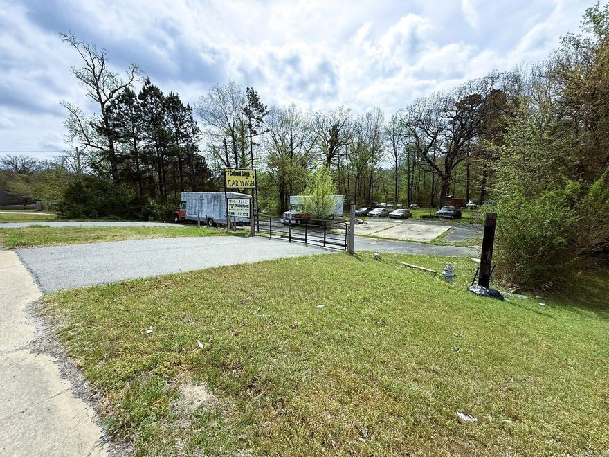 Commercial Opportunity.  Zoned PCD  .92 acres of land has water and sewar on property.  Electric at the street.  Formerly a car wash in the front part of the property, building has been removed.  High traffic road frontage ready for your business venture.