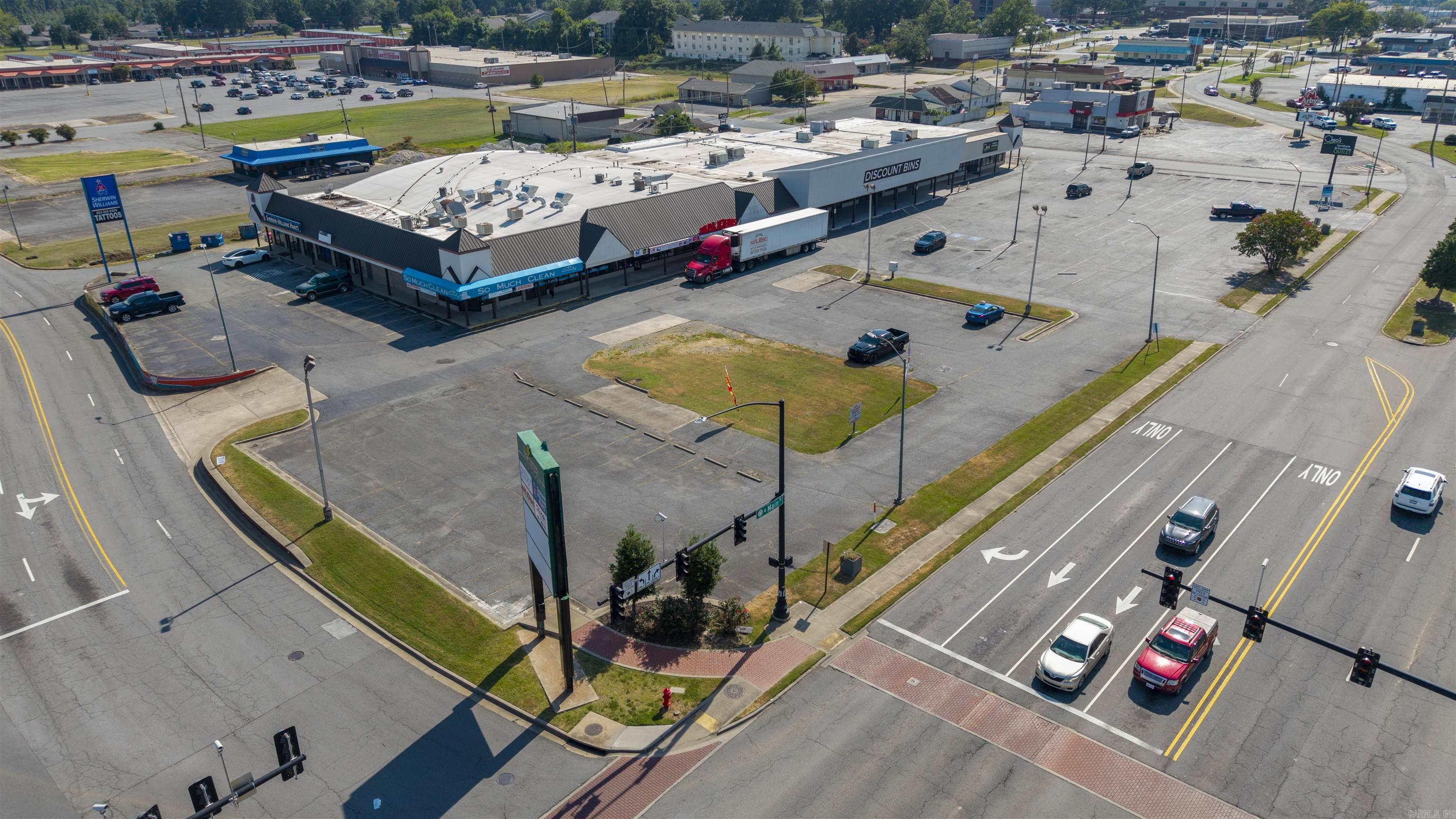 Downtown Jacksonville AR. Prime Corner lot in the "5 Points" intersection with outstanding visibility. C-2 Zoning inside an Opportunity Zone.