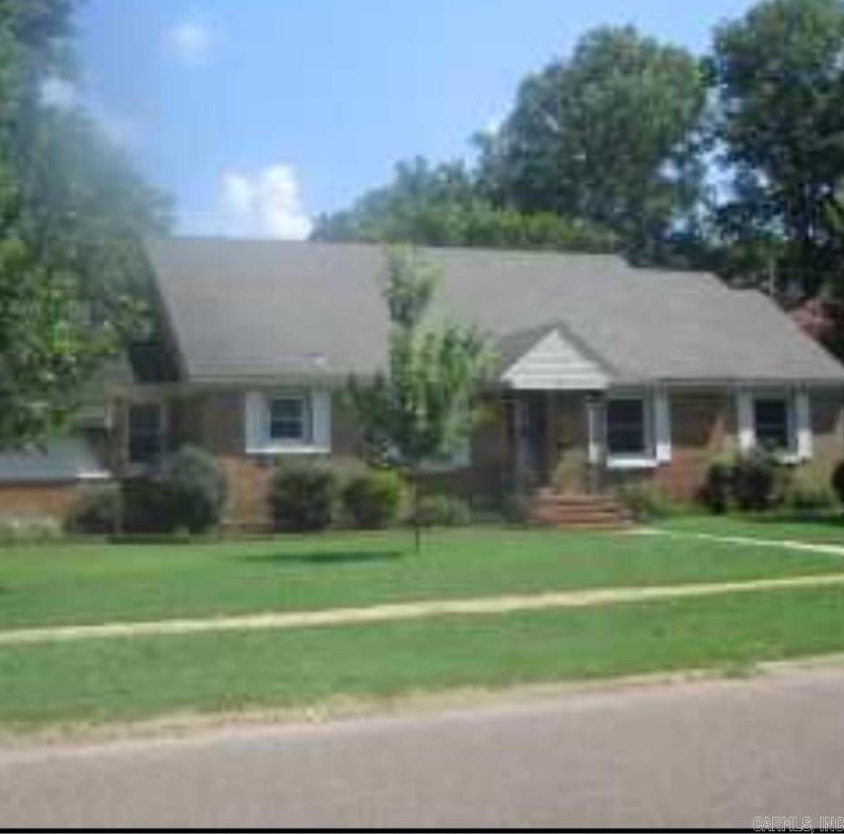 Wonderful home on corner lot with mature trees. This home has charming character and lots of storage. 2 bedrooms and 2 baths, hardwood floors, den with a gas fireplace. A must see.