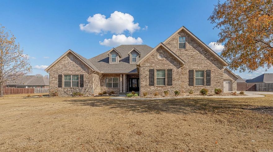 Beautifully maintained 5-bedroom, 3-bath home on a double lot with all the extras. The spacious great room features a fireplace with built-ins and flows into an island kitchen with double ovens, a double-glass-door pantry, and a built-in buffet off the dining area. The floorplan includes an office/den, a huge centrally located laundry room with cabinets and hanging space, and heated/cooled storage off the garage plus a storm room. Enjoy outdoor living on the screened porch overlooking the wood-fenced backyard. Property also includes a double garage, a detached shop, and a whole-home Generac generator. This one has the space, the storage, and the amenities that make everyday living easy.