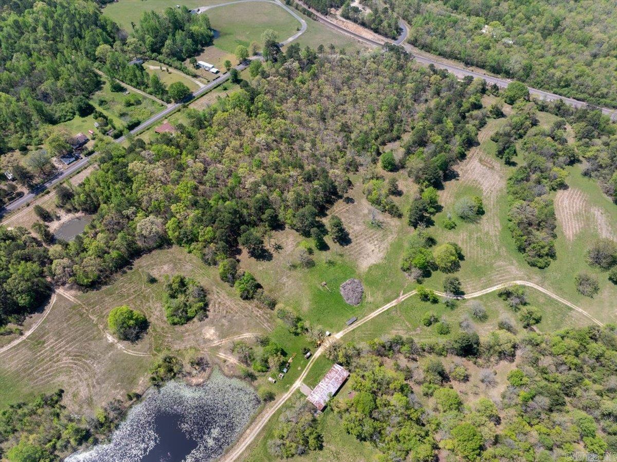 Looking for INCREDIBLE acreage just minutes from town!? This large 125 acre parcel offers a RARE opportunity to own PRIME land extremely close to town and all amenities! The WOW factor is there with THIS property, as it offers STUNNING views of Rich Mountain and beyond! Features include 3 ponds, a mixture of pasture and forested areas, and an established road throughout the property. With so much prime land, there are endless opportunities to build throughout the acreage. Keep it as one, or parcel it out, this would make an ideal investment for developers. Don't miss this incredible opportunity to INVEST in Mena!