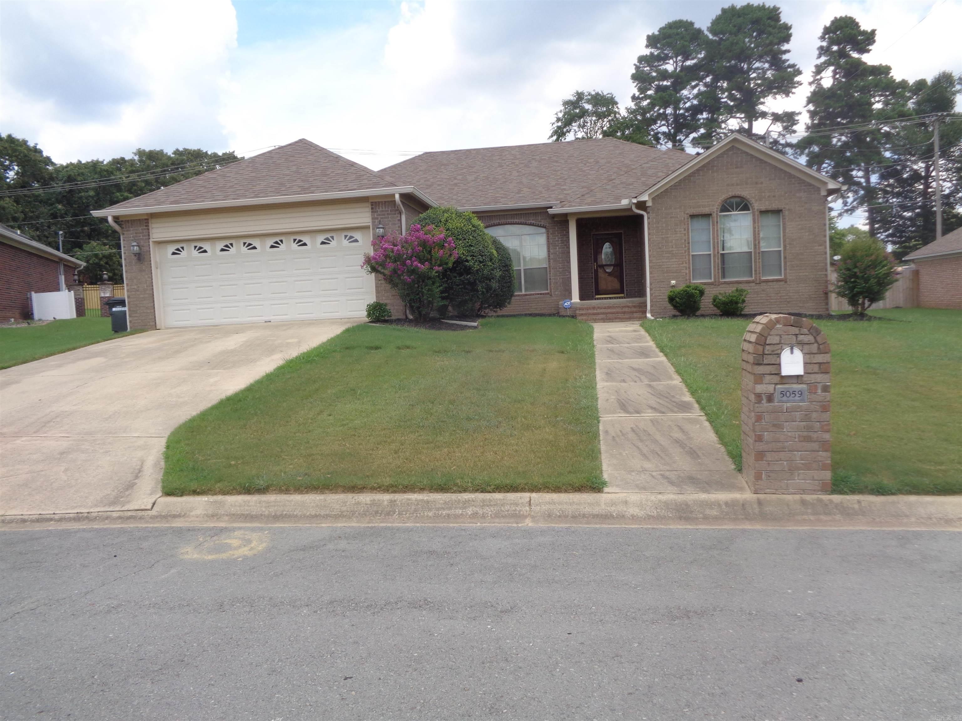 A beautiful all brick home sitting on a large privacy fenced lot in a wonderful hidden neighborhood. This house is a gem. The property features 3 bedrooms, 2 full baths, a large great room with a fireplace, a spacious master bedroom, bath and walk-in closet, an inviting rear sunroom, a formal dining area and a roomy furnished kitchen. NO PETS/ANIMALS ALLOWED! One year lease required. Lawn care is provided.