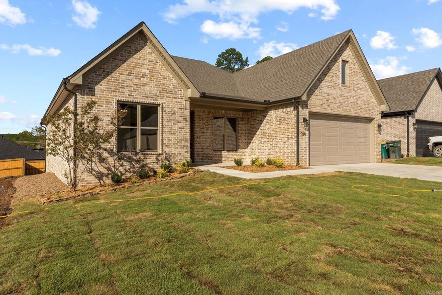 $10K Builder credit towards rate buy down and/or closing costs with approved offer!  Meticulously designed by Graham Smith Construction, this masterpiece is one of your last chances to snag a new construction home in the highly sought-after Parkside at Wildwood community. Never mow again with lawncare included in your yearly POA - that's right, your front and back lawn care will be taken care of! 318 Rosemary offers a thoughtful layout that is perfect for function and style; the chef's kitchen with custom cabinetry that overlooks the spacious dining and living area are truly stunning. The covered back porch area with an outdoor fireplace will be the perfect place to relax this Fall as you overlook your lawn. Make sure you check out the luxurious owner's suite on the back of the home that features a spa-like oasis and a custom closet that dreams are made of! Every detail has been thought of with your every need kept in mind.