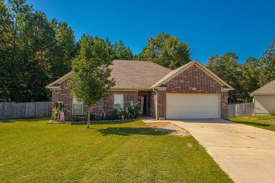 Take a look at this beautiful 3 bed, 2 bath home! This home features high ceilings with crown molding, granite countertops and an open floor plan making the home feel even larger! Walking out the back door you are sure to love the covered/partially screened in patio and the privacy provided by the wooded area behind the home. Conveniently located within walking distance to Bryant Jr High and just a short drive to Benton. Contact your local agent today to schedule a private showing!!