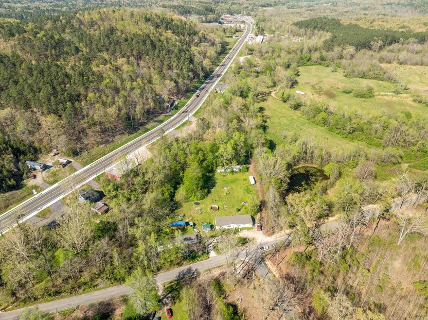3.25 acre tract on Sleepy Valley Road, near Park Avenue is the perfect location for a home or business. Eastern property line includes the western shore of a spring-fed pond. Mobile homes located at front of property are not owned by seller and do not convey. Value is in land only.