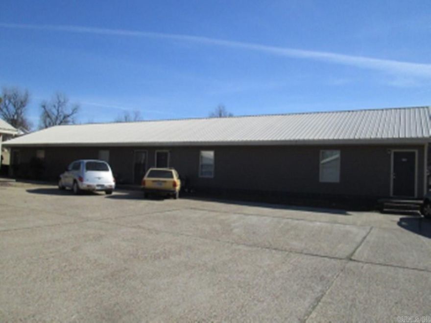 Conveniently located close to schools, churches & downtown. Electric range, fridge & dishwasher furnished. Washer/dryer hookups. Living room/kitchen area is open.  Water & sewer included in rent. Tenant pays other utilities. OPTIONAL: Pay $175 more per month for landlord to pay electric, trash collection. Tenant must pay for their own cable/internet. Interested persons may apply & pay application fee at listing office. HUD/Section accepted.