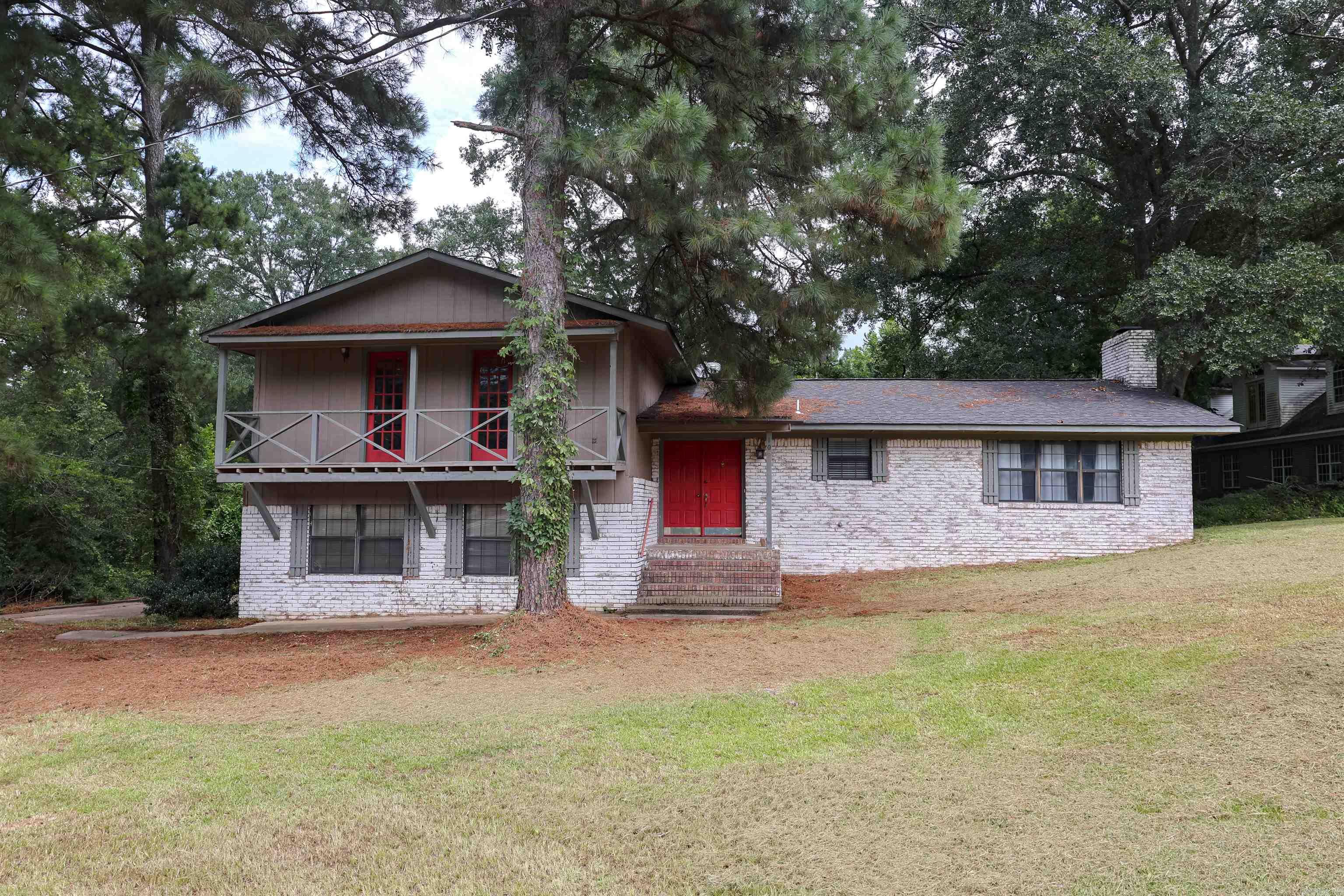 Welcome to this unique and versatile tri-level home located in the Ridgewood subdivision of Nashville. With 4 bedrooms and 2.5 baths, this home offers plenty of room for everyone! The main level features a living room with a fireplace, an open dining area, a spacious foyer, and a functional kitchenāideal for everyday living and entertaining. Upstairs, you'll find three bedrooms and two full bathrooms, each bedroom offering access to a balconyāa rare and charming touch. The lower level provides even more flexibility, featuring a fourth bedroom or second living area, a laundry room, and a convenient half bath. Whether you need extra living space, a home office, or a guest suite, this level can adapt to your needs. Enjoy the outdoors with a spacious multi-level deckāperfect for relaxing or hosting gatherings. A one-car garage completes the package. This home combines character, functionality, and potential. Book your showing today! Property is being sold "AS IS".
