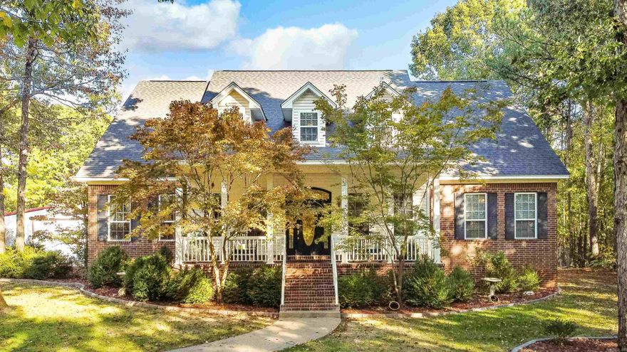 PRIVATE OASIS ON 3.74 ACRES! This charming home lives like a single level, featuring only a bonus room and bedroom upstairs. The spacious living room boasts a stone fireplace and cathedral ceiling, while the gourmet kitchen includes an island with a breakfast bar, a gas range with a double oven, and a dining area. Retreat to the luxurious primary suite with a double tray ceiling and gas fireplace and relax in the updated en-suite bath with a custom tile shower and double vanity. Enjoy versatile spaces on the main level for an office or media room, and relish the flat backyard with a covered porch, a 36x36 heated and insulated shop, RV parking with an electric hookup, and a whole home generator. Beautiful hardwoods throughout, a safe room, and a sprinkler system are just a few of the extras that make this property special. Located in the highly-rated Bryant School District, this exceptional property is just minutes from Bryant and Little Rock. Come start a new life where you can watch deer play from the comfort of your front porch!