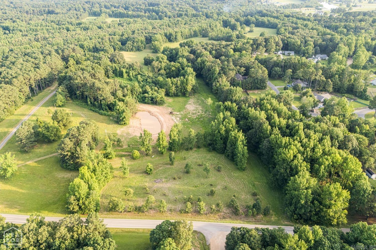 Perfect building spot with a POND in the Brookland School District! Looking for the ideal place to build your dream home with room to breath? This gorgeous 10.13 acre (+/-) parcel offers the perfect blend of privacy, open space, and convenience to Jonesboro- with no restrictions. Already mostly cleared and dotted with mature trees and shaded clusters, this land gives the best of both worlds: a natural peaceful setting and a plenty of room for a spacious home, hobby farm, or whatever your heart desires. Tucked alongside Sherwood Forrest Subdivision, you'll enjoy the convenience of nearby utilities without sacrificing privacy thanks to a large grove of tres that creates a natural buffer from neighboring homes. Finding acreage in Brookland School District is already tough but finding it at just $21,000 per acre and with a new pond? That's almost unheard of. Located on the South side of CR 780, look for the real estate sign.