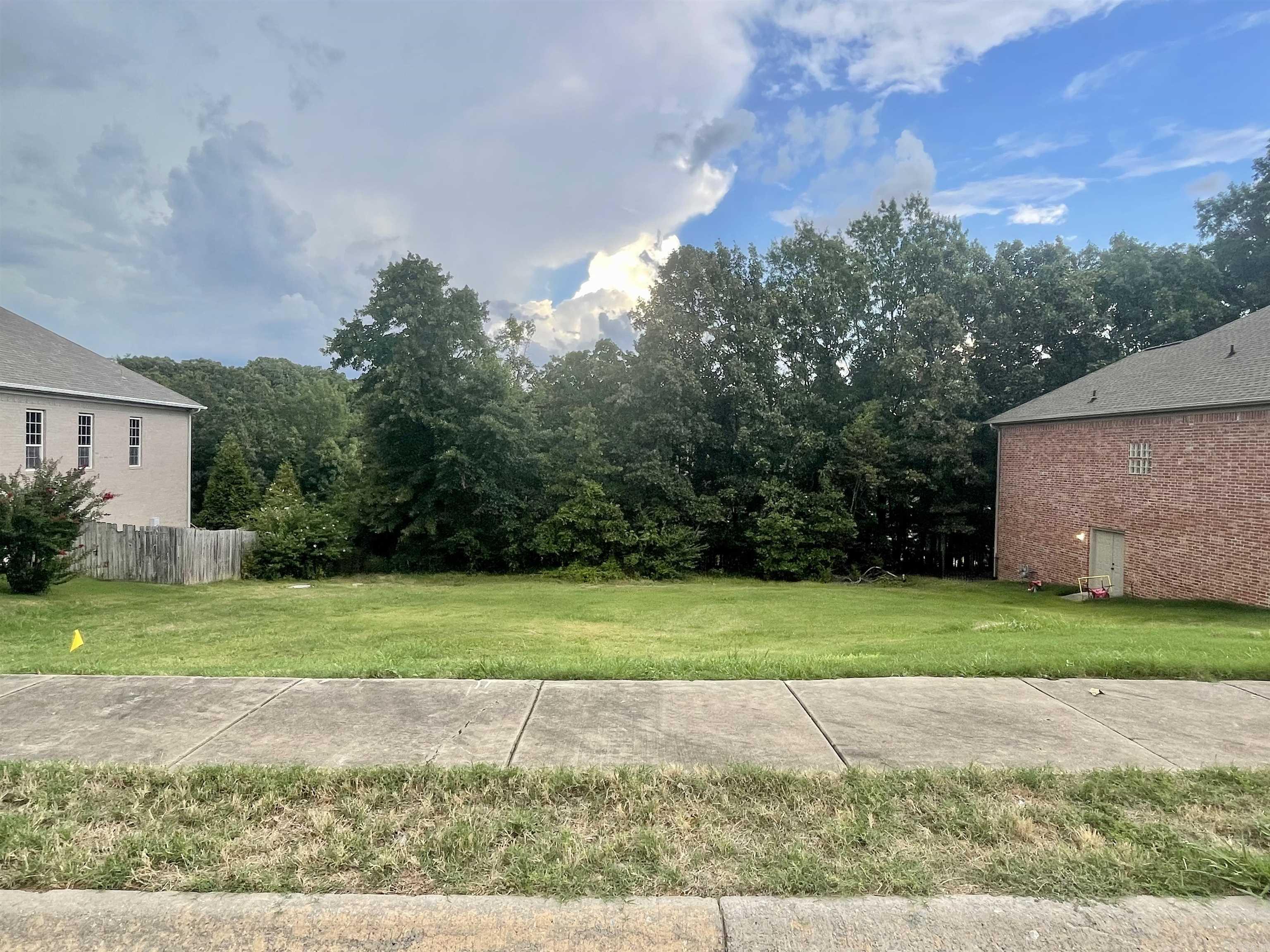 Chance to own one of the last lots in highly sought after Summerwood Addition! Lot has all utilities, and would make a perfect walk out basement build. Front of property is cleared with trees in the back yard for privacy. Lot goes from street to street in the loop to give it a rare layout. Great area on a good sized lot in North Little Rock! Drive out to take a look and bring your house plans to build EXACTLY what you want!