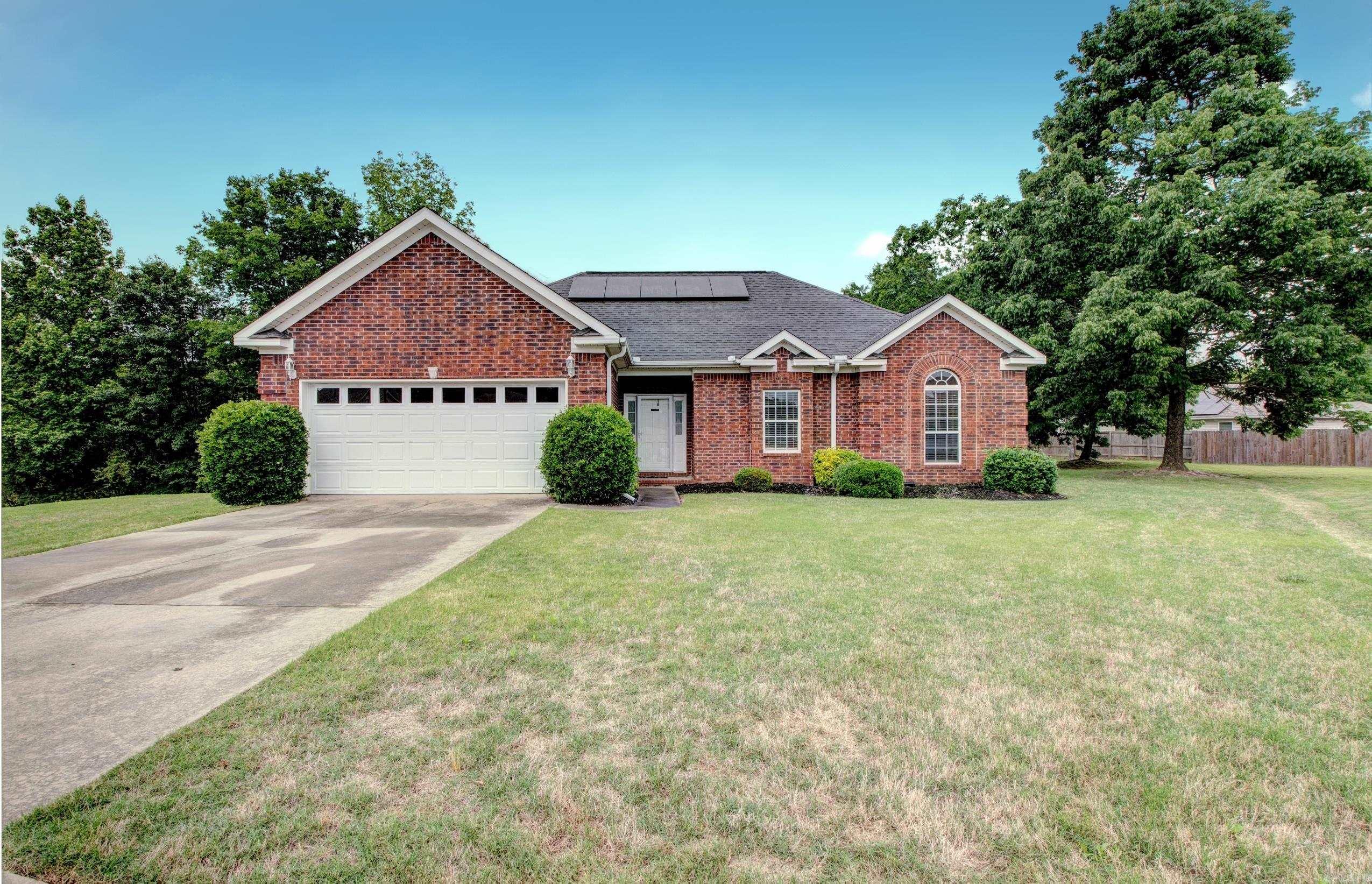 Charming and move-in ready, this 3BD/2BA home offers a spacious open floor plan with a cozy fireplace, trey ceiling, and a sit-in bar perfect for entertaining. Enjoy a formal dining room and a breakfast nook with a window bench overlooking a peaceful meadow. The kitchen features ample cabinetry and sleek black granite countertops, echoed in the elegant foyer. The private master suite includes a luxury bath, with 2 walk-in closet, and sound insulation for added tranquility. Located on a quiet cul-de-sac with great neighbors, a partially fenced oversized yard, new HVAC system, new garage opener, new stove, and solar panels for energy efficiency—this home is a must-see!