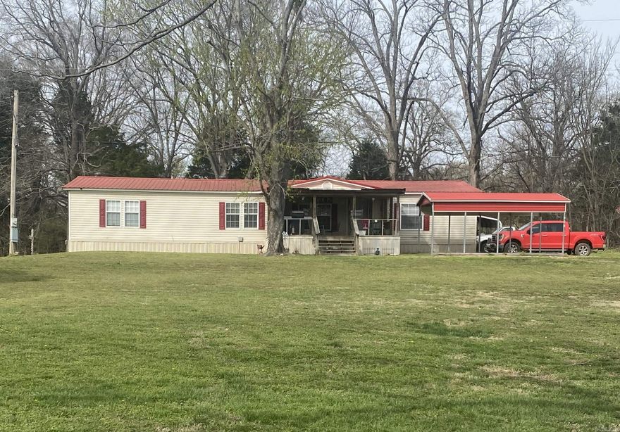 Are you looking for a beautiful country setting with a pond view. This home offers just that. Well maintained 3br/2ba mobile home that is permanently affixed on 2.3 acres. The kitchen, dining room and living room are all connected and offer plenty of space for relaxing or entertaining. There is a large primary bedroom with ensuite and walk in closet on one end and two bedrooms and bathroom on the other. Relax on the front porch and enjoy the pond view surrounded by nature.  High speed, fiber internet available.