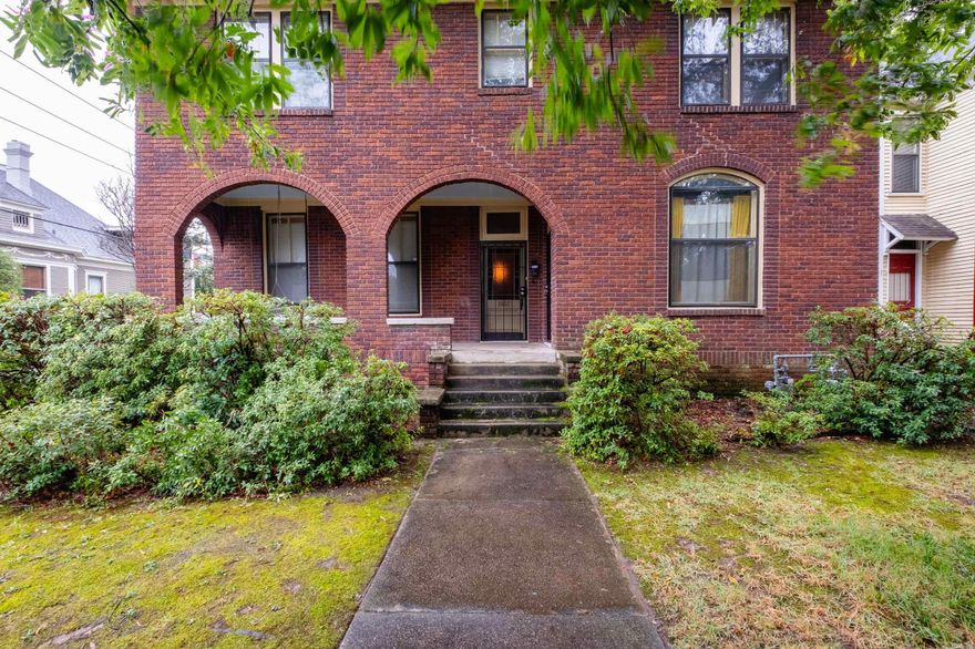 This all brick 3 unit residence features a welcoming front porch entry leading to the spacious main level unit with 3 bedrooms, 2 bathrooms, gorgeous hardwood floors, an updated kitchen and all the charming architectural features of a historic property.  The upper level includes a separate entrance leading to two additional 2 bedroom / 1 bathroom units. All units have washer / dryer connections. The backyard is fully fenced, and the property includes a paved parking area with 5 parking spaces. New roof 2024.  All units are currently leased and tenants would like to stay. Agents please see confidential remarks.