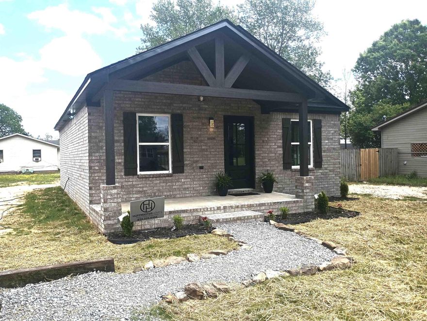 Sleek, modern 2BA, 1BA all electric brick home, just completed and ready to move into. This beauty boasts open floor plan w/ 30" electric fireplace, LVP flooring thru out. White custom built kitchen cabinets w/granite countertops, breakfast bar, farmhouse sink, & electric range. Bathroom features tub/shower combo, and vessel sink, nice sized laundry. Wired for cable and co-axial for satellite dish. New landscaping, chat drive, open front porch and large back yard. Lots of extra touches make this a comfortable home.