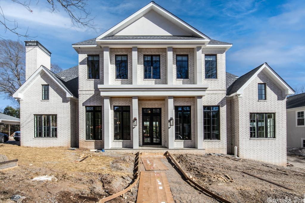 Stunning showcase! Beautifully crafted with attention to detail. Impeccable quality, flawless design and sophisticated decor combine to offer the ultimate setting for family living and entertaining. Gourmet kitchen with top-of-the-line appliances, hand painted tile, exquisite custom millwork. Inviting keeping room with FP. Gorgeous two-story great room with fireplace with stone surround and retractable doors to expansive terraces for outdoor entertaining. Banquet dining. Luxury defined primary suite on the main level, along with full guest ensuite. Upstairs additional guest suites with tremendous playroom, media and in-law quarters and so much more. 4 car garage.