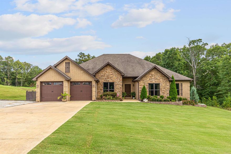 Don't miss this amazing 4 bedroom 3 bath home on Crowley's Ridge. This beautiful open floor plan home with built with a attention to detail. From the crown molding throughout, to the amazing feature wall in the dining area.  The spacious open living area that opens up to the enclosed porch and covered patio. Nestled on  1.25 acres this is great for outdoor entertaining as well.