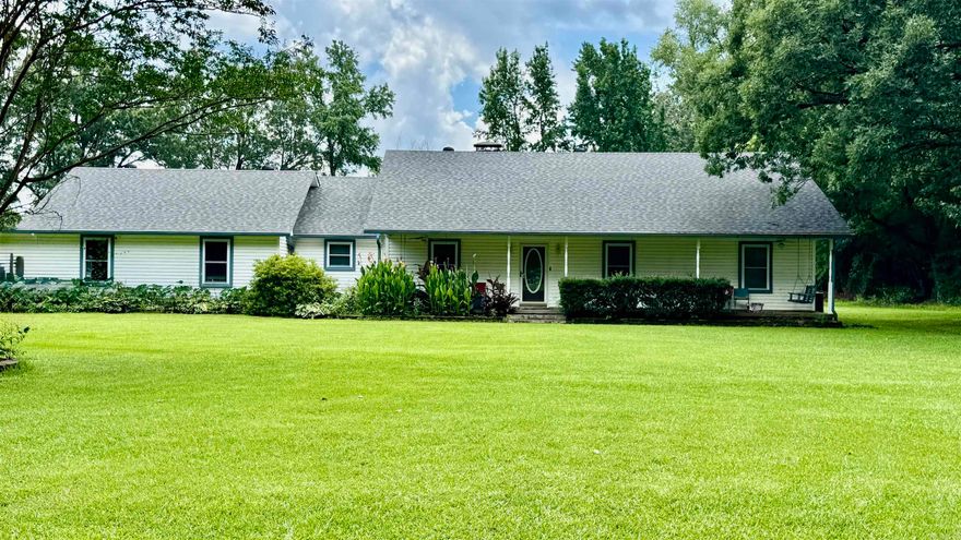 Just in time for summer! This property has it all. 3bd 2ba home on 1.27 acres with a  40x40 shop and a 16x32 unground pool. There is a bonus room that could be another living room, bedroom, or even a big play room. There have been so many improvements to this property. New vinyl flooring,  Driveway was paved 2015, Storm shelter installed 2015, new pool liner 2020, New pool pump & equipment 2021. New roof 2020. New windows and gutters 2021, Solar panels that will be paid off at closing. New heating system, Hot water tank 2019, Master bathroom remodeled with new shower, Carport with 18x20 storage. Old log house on property, Fenced in yard.This home is a must see!