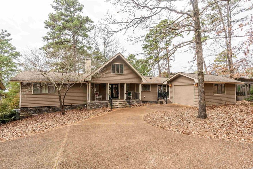 EDEN ISLE - FURNISHED LAKEFRONT HOME!!! -- This lovely Frank McGary-designed home on the west side of Eden Isle has a great lake views and an easy walk to the water! 3-bedrooms plus a 4th loft bedroom, 2 living areas, HUGE screened porch, new roof (in approximately 2017), tons of interior updates in last few years (including brand new kitchen and brand new master bath!) and a foundation that's piered to bedrock! The sunsets will be spectacular! Hurry to see this one!