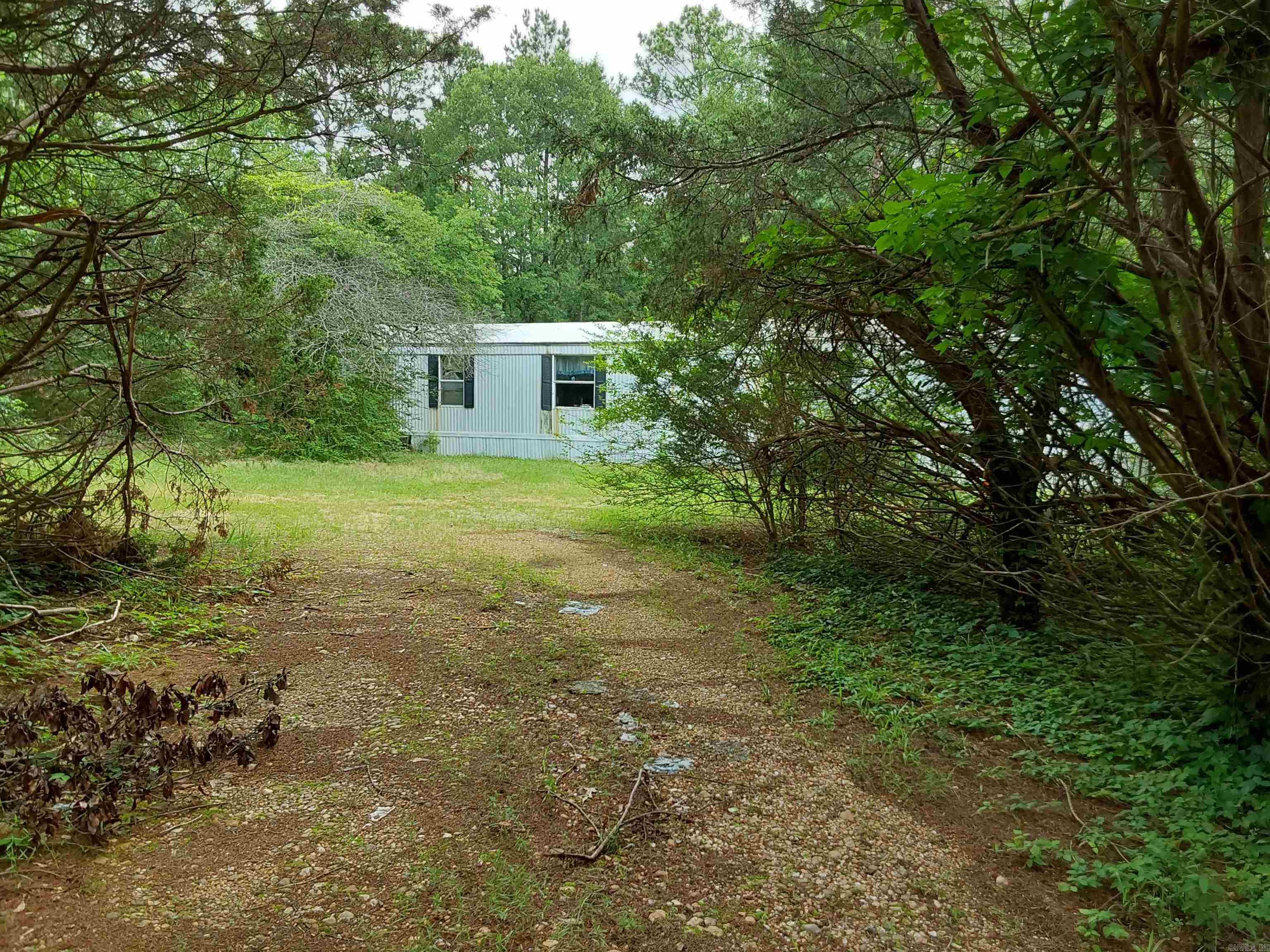 Investment special! Come and put your new home on this 0.78 acres located in the Sardis community. This is being sold AS IS, WHERE IS with no disclosure provided by seller. There is a single wide home located on the property at no value. Agents see remarks.