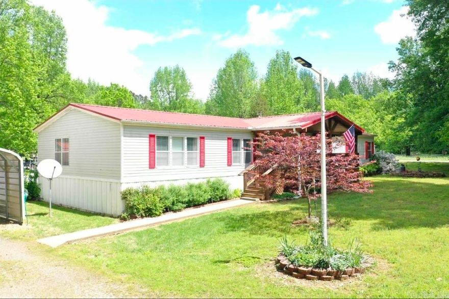 This very well-kept 3 bedroom, 2 bathroom mobile home offers over 2,000 square feet of living space with a spacious and inviting open floor plan. The master bedroom is exceptionally large, creating the perfect private retreat.  Situated on over 4 acres, this property is ideal for a mini homestead with plenty of room for gardening, animals, or enjoying peaceful country living. The property already includes a chicken coop and fenced area for animals, making it ready for hobby farming or small livestock.  A large shop with RV storage provides excellent space for equipment, hobbies, or storing your camper or boat.  Conveniently located just a few miles from town and close to the river, you’ll enjoy both privacy and easy access to local amenities and outdoor recreation.