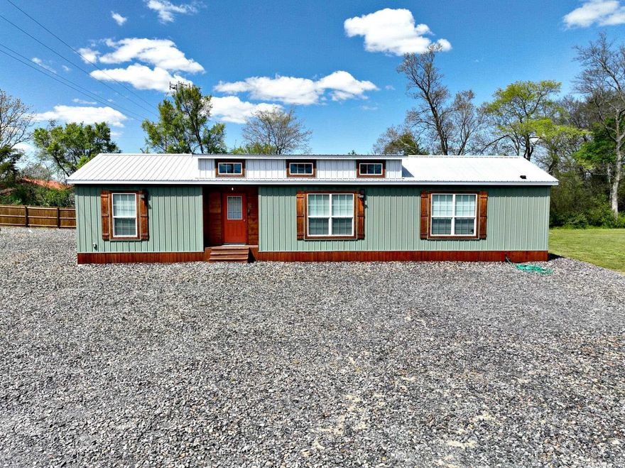 Prime Location! This 2 bed, 2 bath 18 x 60 cabin is ready for your family or for income potential as an established rental. Right on the way to the Wolf Pen Gap ATV Trails.  The Wild Rose Cabin built in 2019 sits on nearly 3 acres w 480 amp electric service & septic capacity to add an additional cabin. Two operational RV sites with sewer, water and 50 amp electric.  All furnishings convey! Sleeps 6.  Laundry. Beautiful cedar touches, ample parking with back porch and fire pit area.  Fenced + storage building