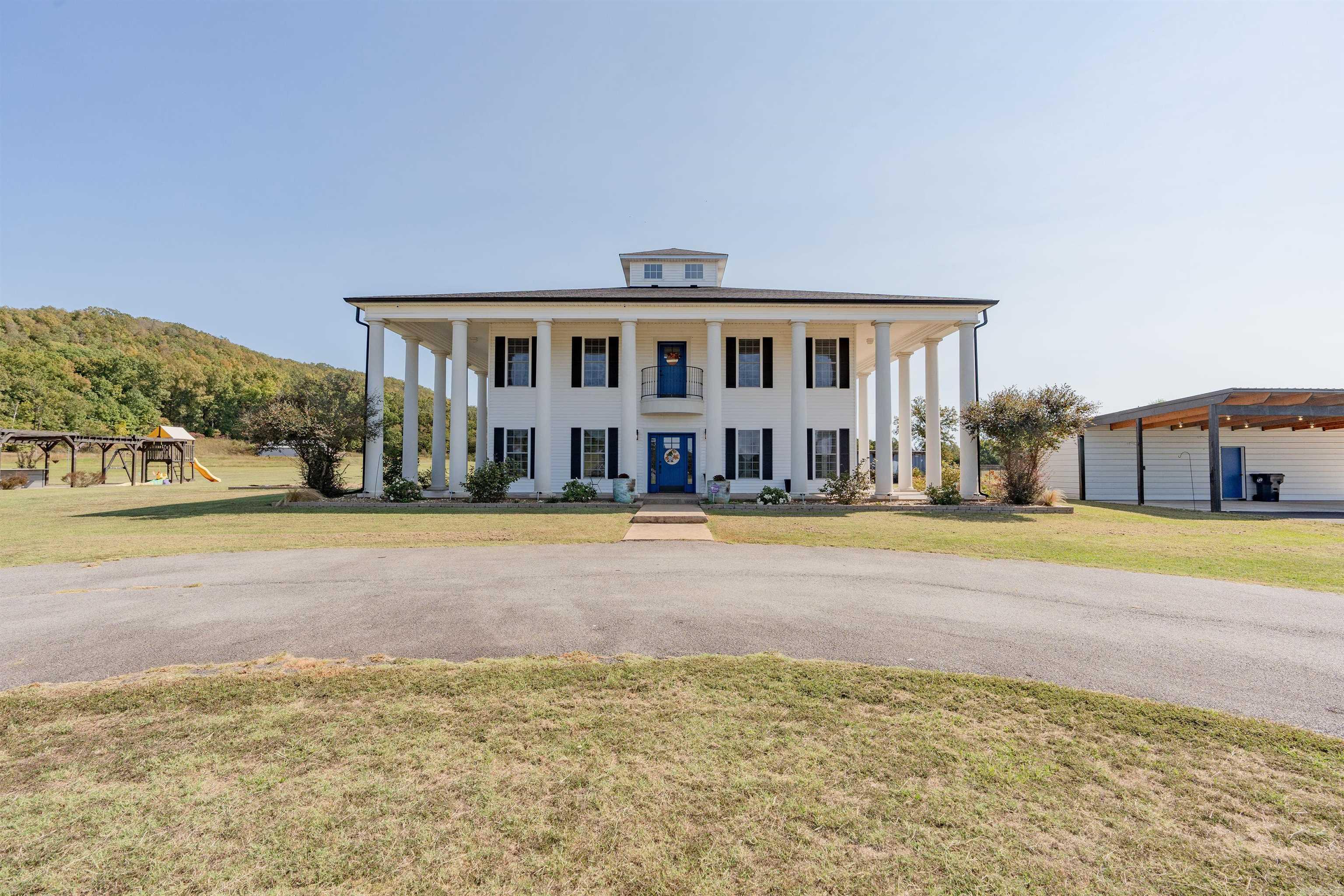 Here is your new HOME! Located just outside Quitman gated and fenced, on aprox 51 acres, outdoor kitchen with granite and built in grill, 40x40 shop, Heated and Air conditioned in ground pool with multiple places to entertain outside and TWO STOCKED ponds (one is in the wooded area) Inside you have GORGEOUS luxury vinyl flooring and tile and two stories worth of family living! Downstairs is the master with a concrete safe room, walk in closets, dining room with coffee nook, kitchen and living combo! Upstairs is a living area, office, with two bedrooms (on each side, total 4 bedrooms) with walk in closets, and both sets of bedrooms feature Jack and Jill bathrooms. So many extras and so much to love, you have to see it!