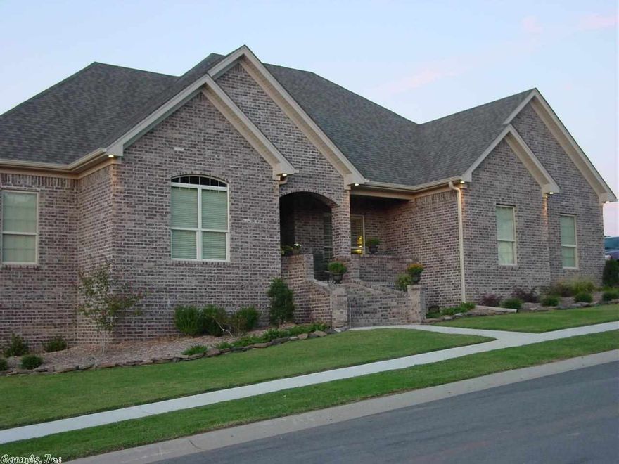 Custom upgrade features throughout, rock front fireplace, rock front covered breakfast bar, granite throughout, lots of custom molding, top of the line gas range, even upgrade to shower doors, extra built-ins in all 3 bathrooms, plus built-in entertainment center in over-sized family room, beautiful bonus room on back of home with lots of glass, perfect for second den, all this on corner lot with extra landscaping and even circle drive on the side for additional parking, COME TAKE A LOOK!!!!! Owner/Broker