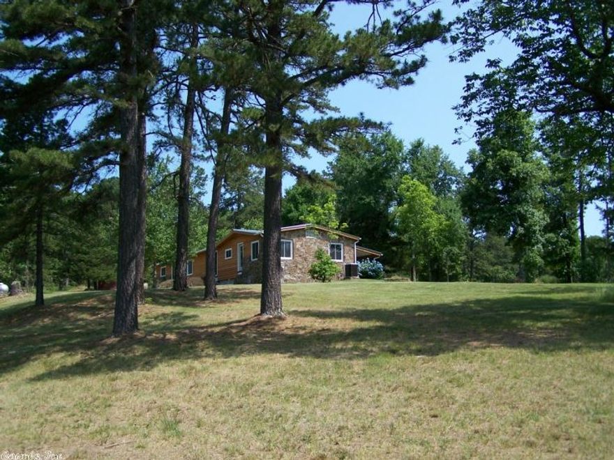 Fantastic views and privacy in this mountain getaway / retreat. Beautiful two bedroom home with spectacular Ozark surroundings. Fifteen acres of pasture and the remainder of the 120 acres is large timber and hunting land. Rocks, trails, caves spring surrounded this bear country mountain ranch.