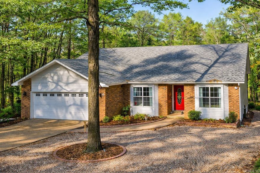 Welcome home to this open, bright, and beautifully updated property- truly a must-see! Fully remodeled in 2023 with quartz countertops, this home features an oversized primary bedroom, stylish LVP flooring, LED and recessed lighting, and a highly functional layout with abundant storage throughout. The main level offers two bedrooms, two bathrooms, a well- appointed kitchen, inviting living room, and a convenient laundry room. The spacious primary suite includes two large walk-in closets and direct access to the back deck, perfect for enjoying the outdoors.   The lower level boasts new carpet, a traditional bedroom, a full bathroom, and a second living area currently used as a bedroom and already plumbed for a kitchenette- ideal for guests, extended living, or future income potential. A bonus room off the downstairs storage area serves as a cozy animal suite, complete with a pet door leading to the lower backyard patio.  Don't miss this incredible opportunity, schedule your showing today! Agents, see remarks.