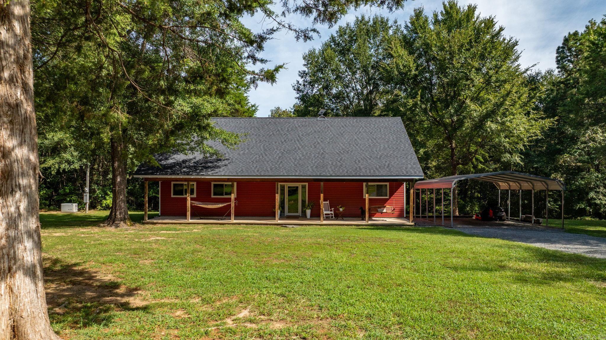 Welcome home to this 3 bedroom, 2 bath retreat on 7 acres. A gated entrance leads to a charming home with a welcoming front porch, perfect for relaxing and taking in the peaceful views. Enjoy peace of mind with a storm cellar and full-home generator, new roof, plus a large shop offering plenty of space for hobbies or storage. This property truly captures the best of country living.