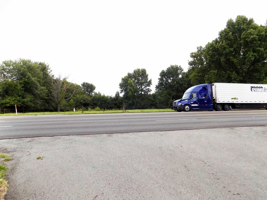 Subdivision property or large business.Seller can sell more land or less.Hwy 65 frontage. 31.5 Acres in Down Town Greenbrier Arkansas.  Has  50 ft of Highway 65 frontage and has city water and natural gas, city sewer accessible. Great location for commercial business or a subdivision. Buyer must have proof of funds and put up earnest money with a contract.  Mo minerals convey.  Cows are on this land currently so schedule appointment with list agent please