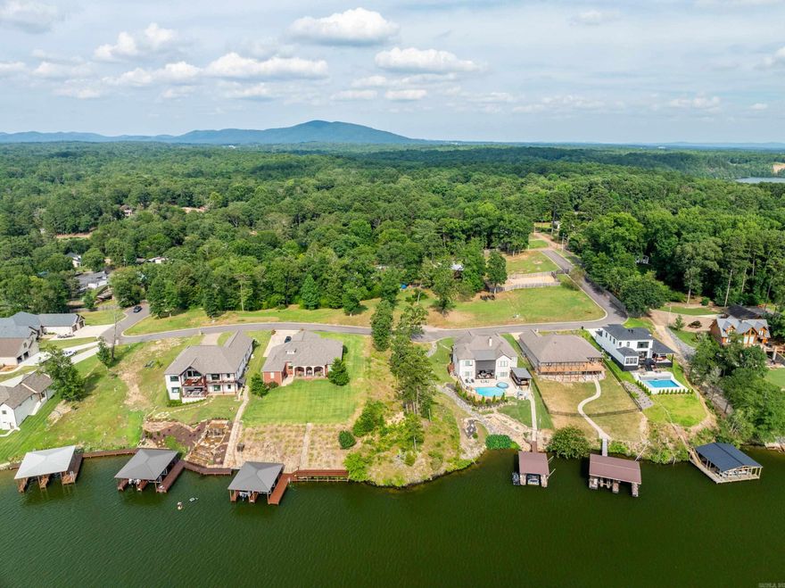 Tucked behind the gates of Oak Ridge Lake Estates lies a rare opportunity—one of the last untouched lots overlooking Lake Hamilton, where golden sunsets spill across a panoramic view. Just a minute from Hwy 270, with effortless access to both Lake Hamilton and Lake Ouachita, you’re perfectly positioned for double the adventure, serenity, and investment potential. The views are big, the vibe is elevated, and the timing couldn’t be better—before everyone else discovers it. Community boat ramp for lake access