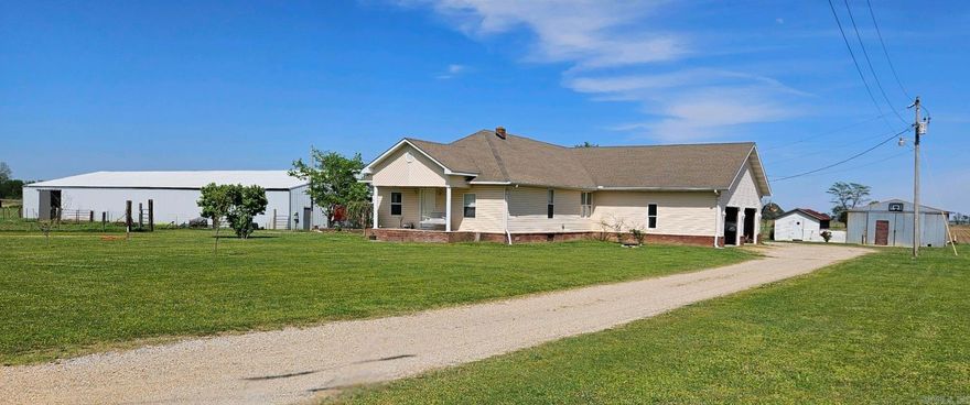 ?? Welcome to Your Dream Equine Haven! ??  Discover the ultimate equestrian paradise nestled on 14.04 acres of lush, fertile land. This stunning property offers everything you need for a life of luxury and leisure, including a charming 3-bedroom, 2-bathroom home with a spacious 992 sq ft over sized garage. ?? Home Sweet Home ?? Step into tranquility as you enter your 1688 sq ft oasis. The home boasts a large den with a coffered ceiling and a cozy fireplace, perfect for unwinding after a day of riding. The gourmet kitchen features ample counter space, a gas stove, and a convenient workspace bar area, ideal for preparing meals sourced from your own bountiful garden. Plus, all kitchen appliances stay and are less than 3 years old, ensuring modern convenience and reliability. Entertaining Made Easy ?? Host family and friends in style with a formal living room adjacent to the kitchen, creating the perfect flow for gatherings. Enjoy the beautiful outdoors from the comfort of your rear 12 x 20 patio or the charming 7 x 17 front porch, providing additional space for outdoor entertainment and relaxation.
