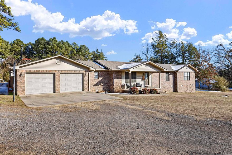 Welcome home to this beautifully maintained 3-bedroom, 2-bath property situated on a full acre. Recently updated, the home features custom cabinetry and granite countertops with an open, functional layout. The living room offers a cozy electric fireplace, perfect for relaxing evenings. The spacious master bedroom is complete with large soaking tub, separate shower, and a walk-in closet. Two additional bedrooms provide comfortable space for family, guests, or a home office. Outside, you’ll find a partially privacy fenced backyard ideal for pets, along with a patio for outdoor entertaining. The home has landscaping that enhances the front entry. The large shop offers a large overhead garage door and upper level for storage area. A standout feature in large shop, is the small living quarters on the front side. The shops living area includes an open-concept design with a Murphy bed, bathroom, and kitchenette —perfect for guests, hobbies, or extra flexibility.