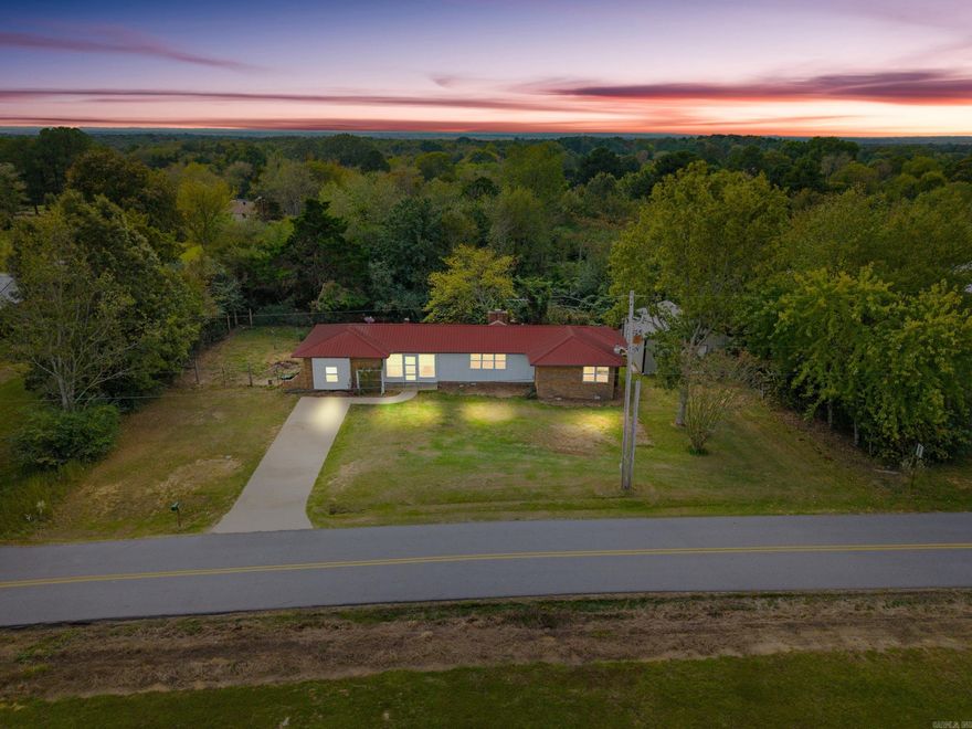 Charming home near the heart of Beebe with a cozy country feel. Many updates make this residence move-in ready for the new owner. The spacious primary suite is separate from the other two bedrooms, offering privacy and comfort. The updated kitchen features granite countertops, new cabinets, and a stylish backsplash. All new windows, roof, HVAC system, appliances, and hot water heater were installed in 2019. Additionally, a newly added large shop provides ample storage space and a perfect hangout spot.